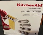 Kitchenaid 5-PIECE Pasta Deluxe Set Attachment, Stainless Steel, New. Fixed Price $234.99.