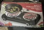 Double Burner Metal Electric Stove Black. Fixed Price $50.00.