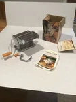 Himark Pasta Queen Noodle Making Machine Item# 15-4595 Clamp Recipe Booklet. Fixed Price $39.95.