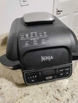 Ninja Food 4QT Indoor Grill And Air Fryer - Black Never Used. Fixed Price $120.00.