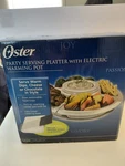 Oster Party Serving Platter With Electric Warming Pot TSP200 Open Box New. Fixed Price $36.00.