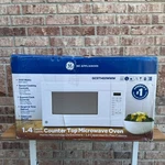Ge Countertop Microwave White 1.4 Cu Ft 1100W GCST14S1WWW Open Box Side Dent. Fixed Price $179.89.
