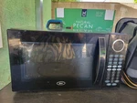 Oster 1.1 Cu Ft 1100W Digital Microwave Oven - Black. Fixed Price $35.00.