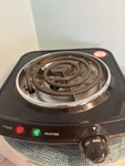 Single Coil Electric Burner And Hot Plate, 1100W, Black. Fixed Price $9.95.