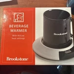 Brookstone Beverage Coffee Candle Warmer Hi/low Heat Settings 236117. Fixed Price $19.99.