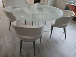 Dinning Set With Glass Top 54" Round And Four Ostrich Leather Chairs. Fixed Price $2400.00.