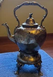1785 Reed & Barton Silver Plate Tilting Coffee Pot Stand W/burner Beaded W/bird. Fixed Price $625.00.