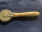 Norpro Stainless Steel Pastry Pasta Crimper Cutter With Wood Handle. Fixed Price $9.99.