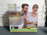 New Food Dehydrator, Nutrichef Kitchen Electric Countertop Preserver PKFD12. Fixed Price $54.95.