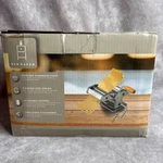 Den Haven Stainless Steel Pasta Maker Adjustable Settings 3 Blade Attachments. Fixed Price $12.00.