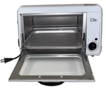 Elite Cuisine By Maxi-matic Toaster Oven Broiler Model EKA-7210X: Never Used. Fixed Price $30.00.