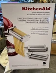 Kitchenaid Stand Mixer Attachment 3 Piece Pasta Roller & Cutter Set. Fixed Price $105.00.
