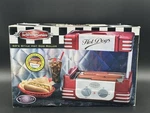 Bnib Nostalgia Electrics Retro Series 50 Style Hot Dog Roller RHD-800. Fixed Price $89.99.