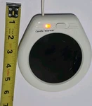 Euro East Electronics Limited Electric Candle Warmer ECW-001 White/black Round. Fixed Price $19.99.